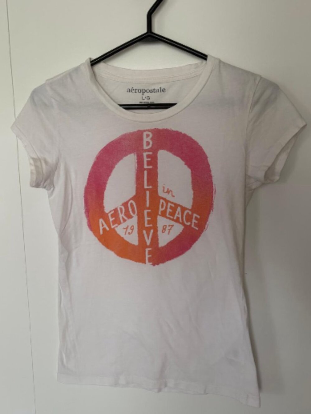 White Crew-Neck Cap-sleeved T-shirt from Aeropostale with Peace Sign Decal